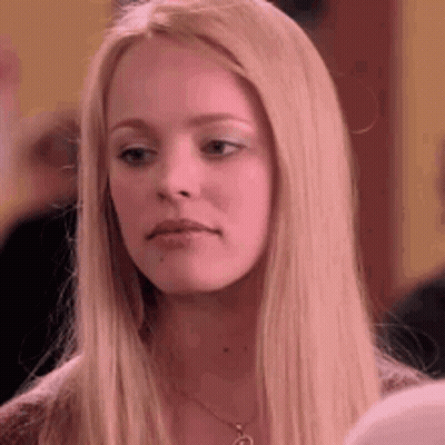 Taylor Swift In Black Off The Shoulder Top Looking At Camera GIF
