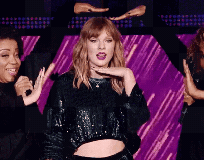 Taylor Swift In Red Sequin Jacket Singing GIF