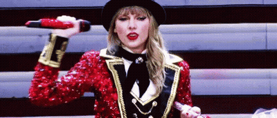 Taylor Swift In Red Sequined Jacket Singing GIF