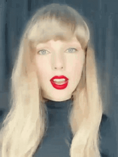Taylor Swift In Wig And Red Lipstick GIF