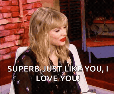 Taylor Swift Is Sitting In A Chair And Says `` Superb Just Like You , I Love You '' . GIF