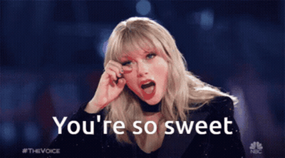 Taylor Swift Says " You 'Re So Sweet " While Holding Her Hand To Her Face GIF