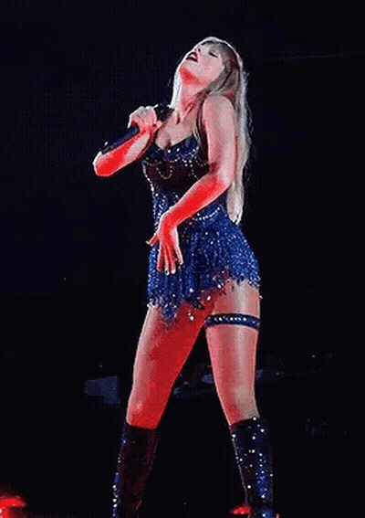 Taylor Swift Singing Into Microphone In Blue Dress GIF