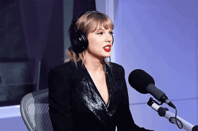 Taylor Swift Singing Into Microphone With Headphones GIF