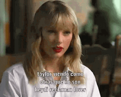 Taylor Swift Tongue Sticking Out Meme GIF