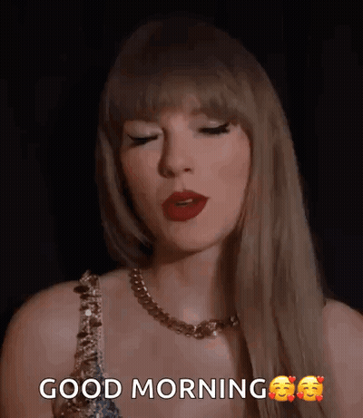 Taylor Swift Wearing Necklace Says Good Morning GIF