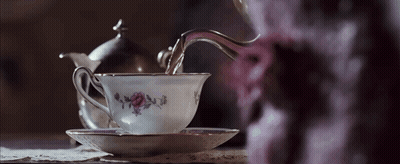 Tea Poured Into Floral Cup GIF