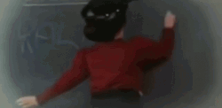 Teacher Writing Christmas Story On The Board GIF