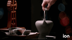Teapot Water Pouring In Small Bowl GIF