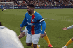 Ted Lasso Players Running Backward GIF