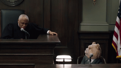 Teddy Bear At Courtroom Microphone GIF