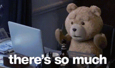 Teddy Bear At Desk With Laptop Saying There's So Much Above Him GIF