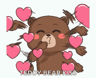 Teddy Bear Blowing Kiss Surrounded By Hearts GIF