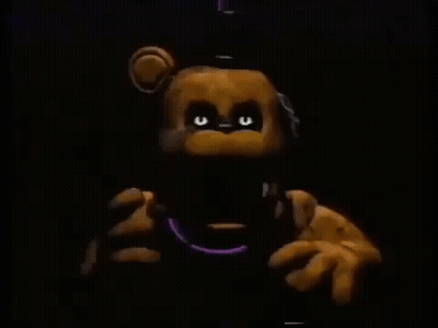 Teddy Bear Close Up Glowing Eyes Dark Room GIF
