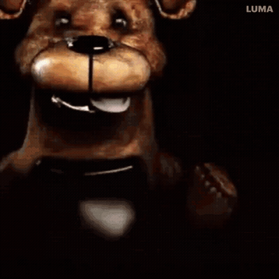 Teddy Bear Close Up With Mouth Open in Dark Room