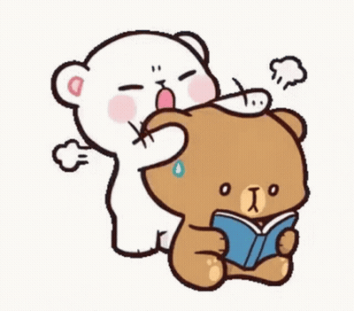 Teddy Bear Holding Another Teddy Bear's Head While Reading Book GIF