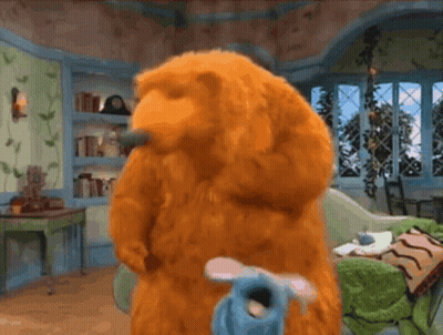 Teddy Bear Holding Blue Mouse GIF