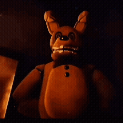 Teddy Bear Holding Knife in Dark Room