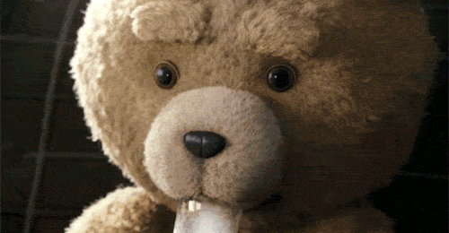 Teddy Bear Holding Paper GIF