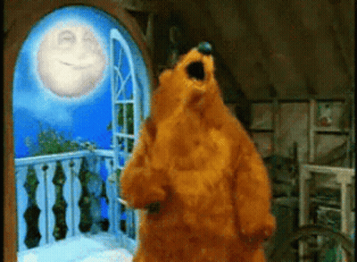 Teddy Bear In Front Of Window With Smiling Moon GIF