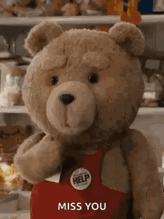 Teddy Bear In Red Apron Saying Miss You GIF