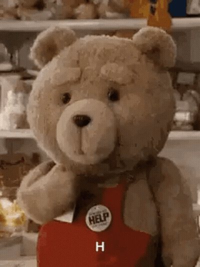 Teddy Bear In Red Apron With Help Button GIF