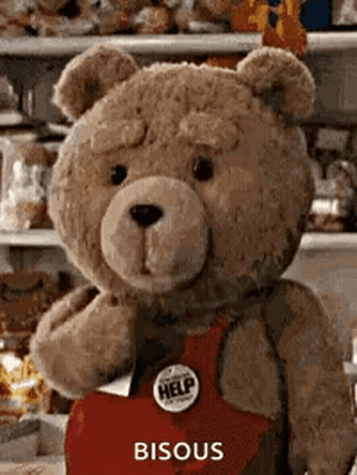 Teddy Bear In Red Apron With Help Button GIF