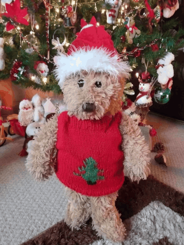 Teddy Bear In Santa Hat And Red Sweater GIF