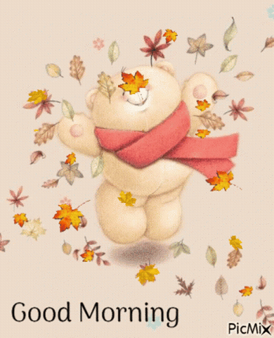 Teddy Bear In Scarf Surrounded By Autumn Leaves Saying Good Morning GIF