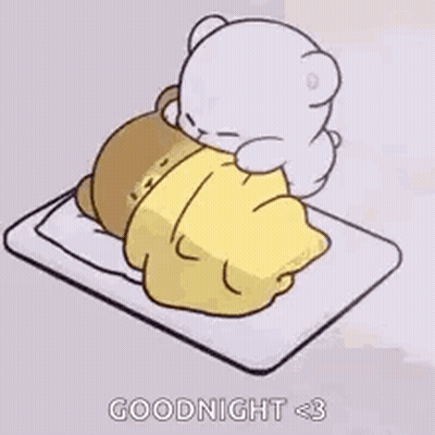 Teddy Bear Laying On Bed With Blanket GIF