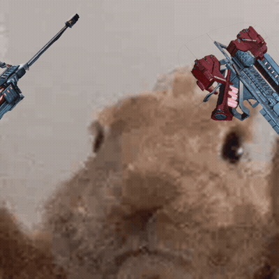 Teddy Bear Looking At Sniper Rifle With Red Barrel GIF