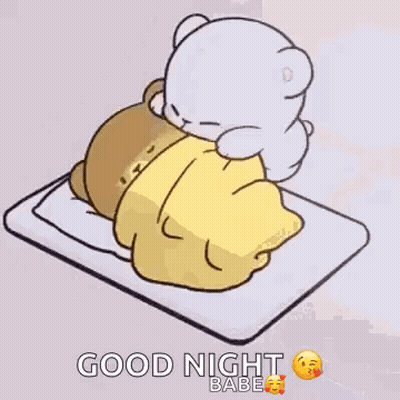 Teddy Bear Lying On Bed With Blanket GIF