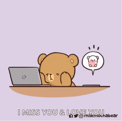 Teddy Bear Sitting At Desk Looking At Cell Phone GIF