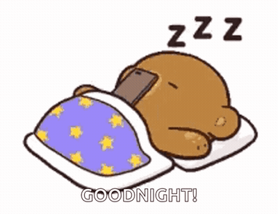Teddy Bear Sleeping in Bed With Cell Phone