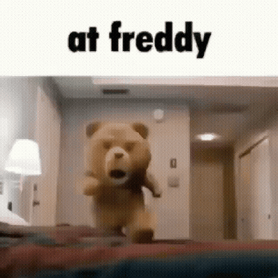 Teddy Bear Standing On Bed GIF