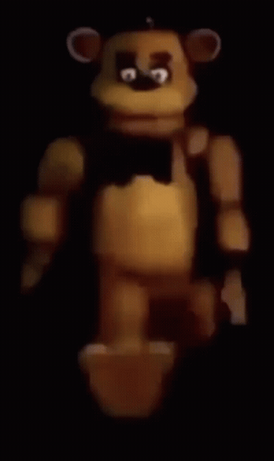 Teddy Bear With Black Bow Tie In Dark GIF