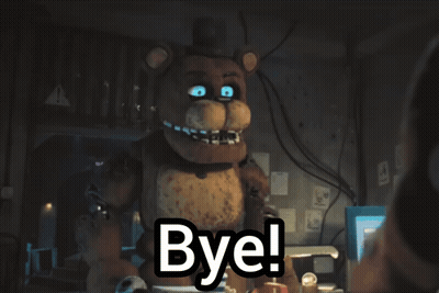 Teddy Bear With Blue Eyes Saying Bye In Dark Room GIF
