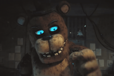 Teddy Bear With Glowing Blue Eyes Making Funny Face GIF
