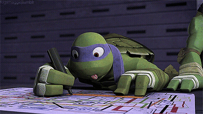 Teenage Mutant Ninja Turtle Lying On Table Writing GIF