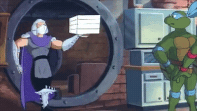 Teenage Mutant Ninja Turtle Standing Next To Pizza Box GIF