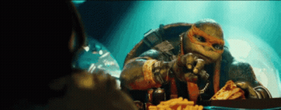 Teenage Mutant Ninja Turtle With Pizza GIF
