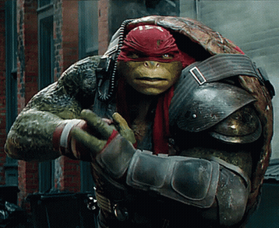 Teenage Mutant Ninja Turtle With Red Headband And Armor GIF
