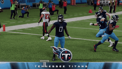 Tennessee Titans Players On Field With Logo GIF