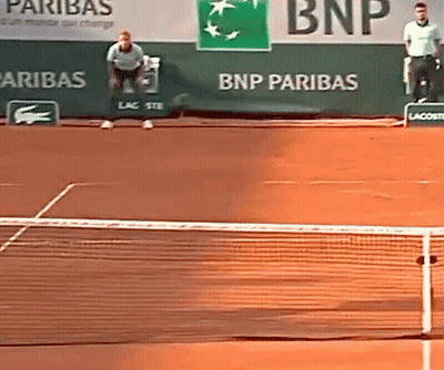 Tennis Court With BNP Paribas Banner Behind Net GIF