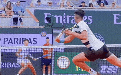 Tennis Match In Front Of Emirates Sign GIF