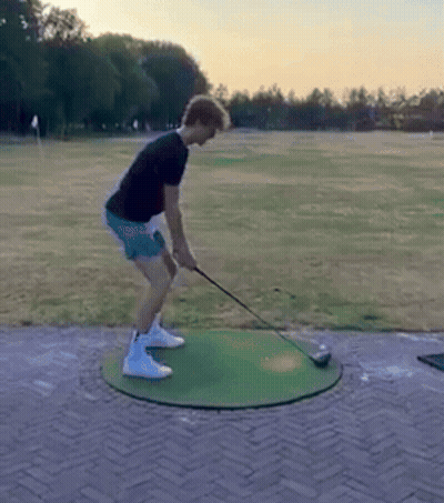 Tennis Player Holding Racket Before Sof Sign GIF