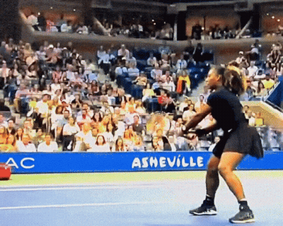 Tennis Player In Front Of Asheville Banner GIF