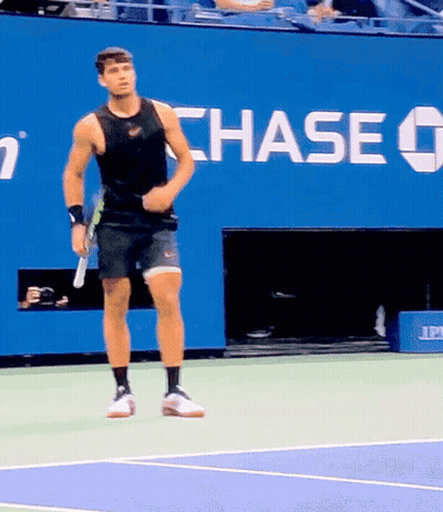 Tennis Player In Front Of Chase Bank Sign GIF