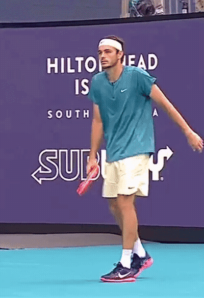 Tennis Player In Front Of Hilton Head South Sign GIF