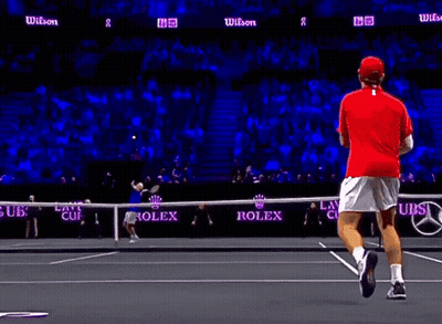 Tennis Player In Red Shirt Running On Court GIF